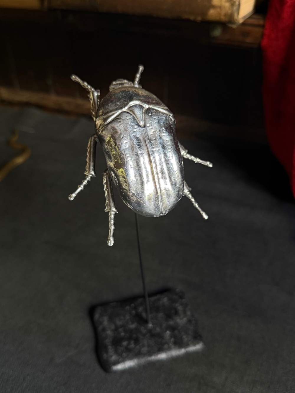 chrome tone beetle faux specimen sculpture on stand · curiosity cabinet insect
